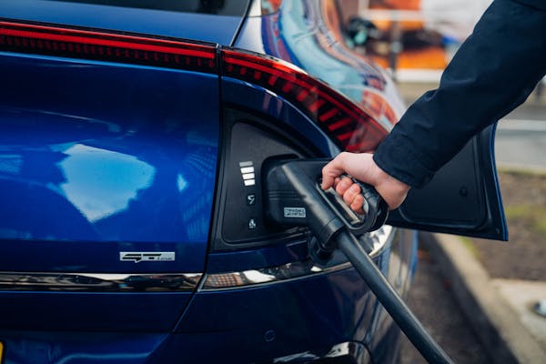 Blue Kia EV6 public charging