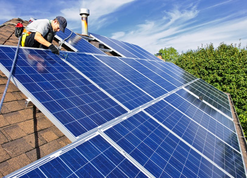 Polycrystalline solar panels being installed on a roof