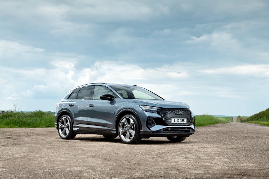 audi q4 e-tron electric car with cloudy background