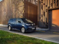 volkswagen id buzz cargo electric van in navy, parked at warehouse