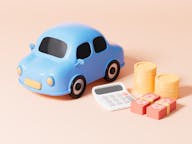 blue toy car and calculator