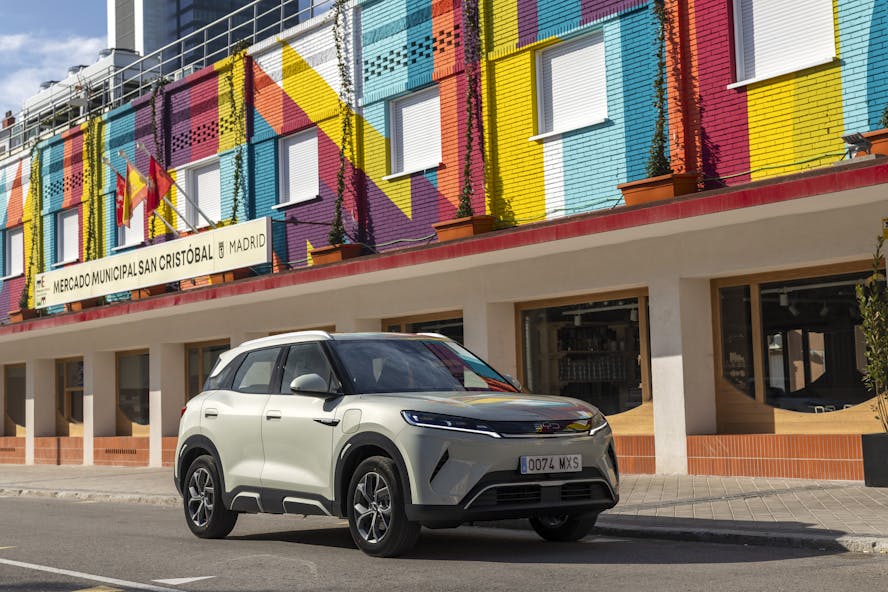 BYD Atto 2 electric car parked in front of colourful building