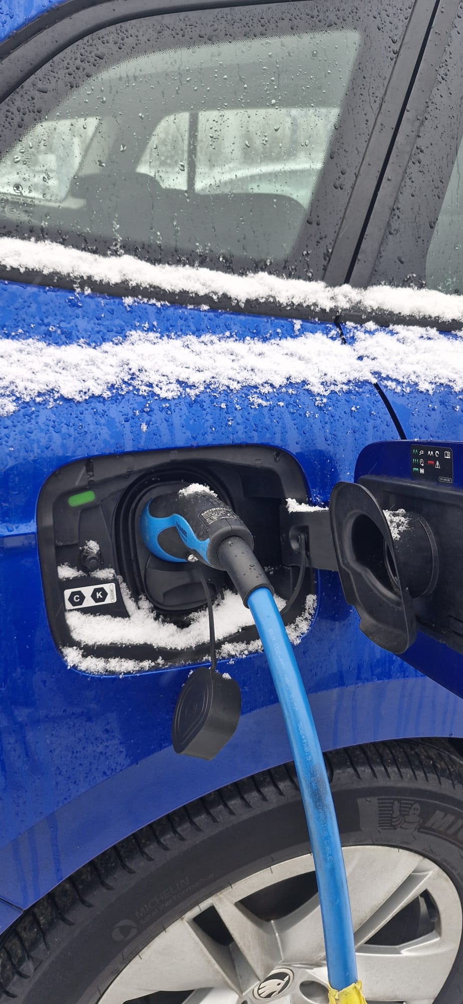 Snowy Charge Port Skoda Enyaq