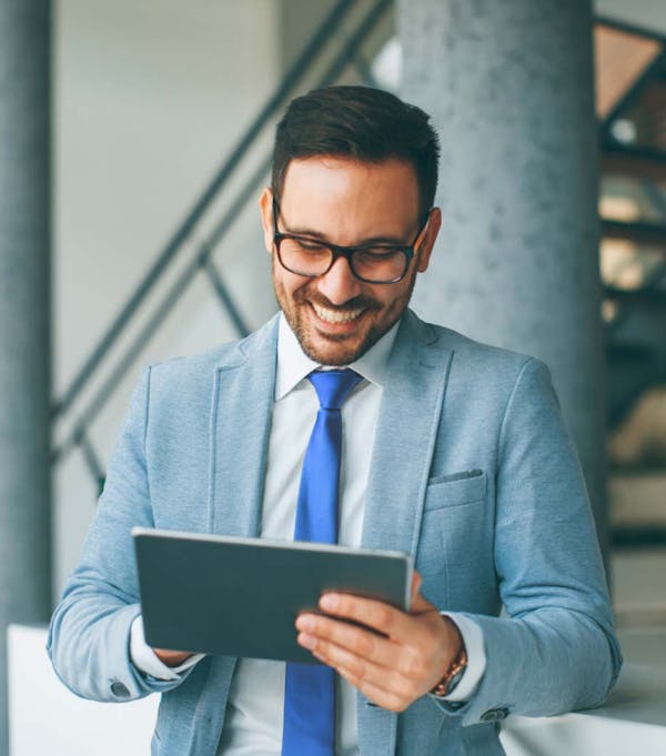 business man on ipad