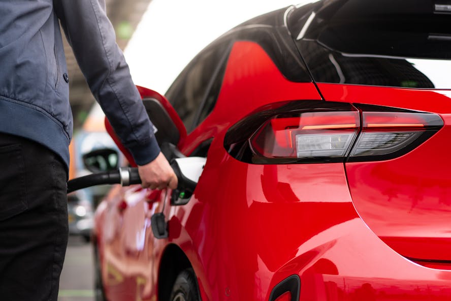 Vauxhall corsa-e electric car plugging into charging port