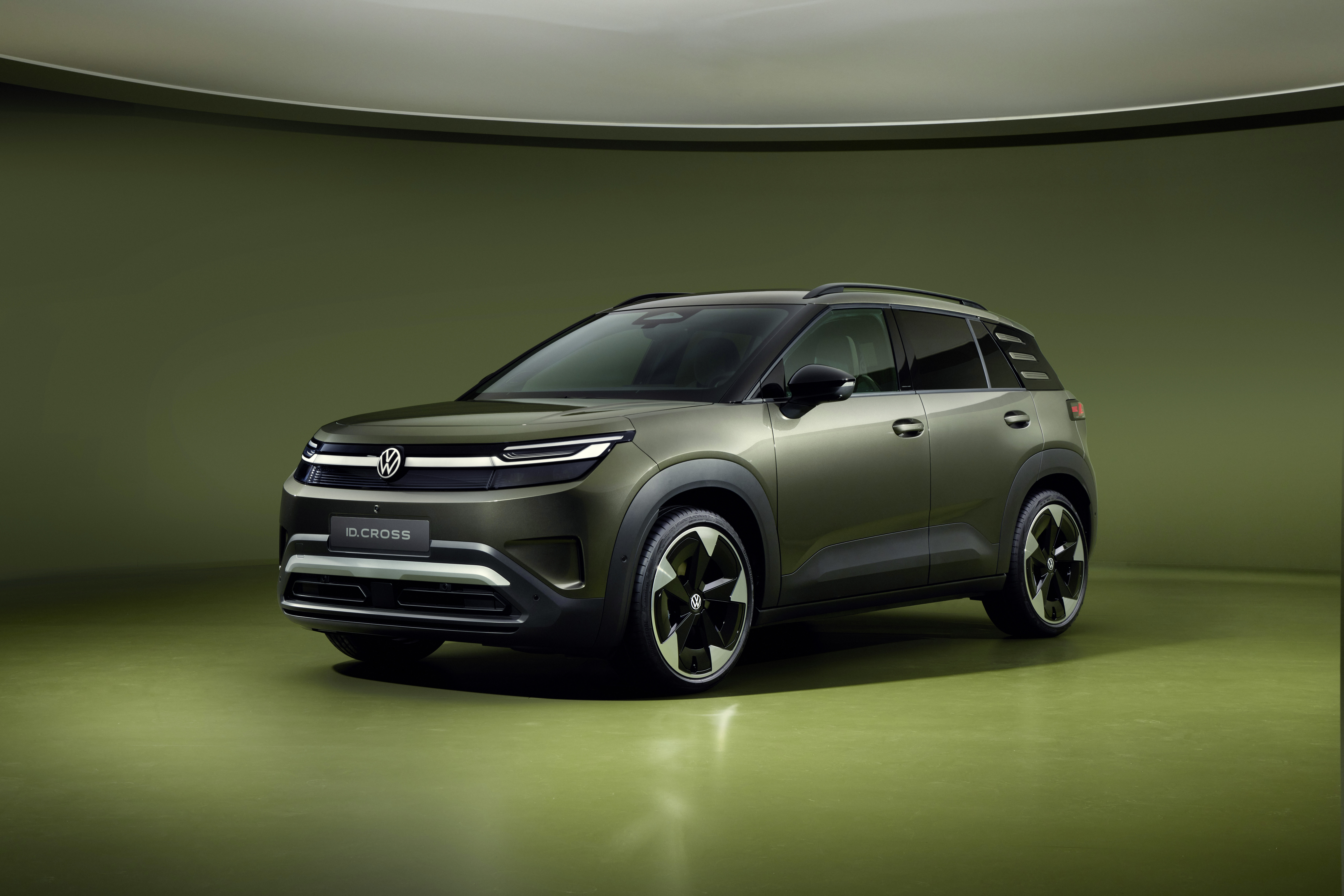 Volkswagen electric car id cross model render, green car on green background