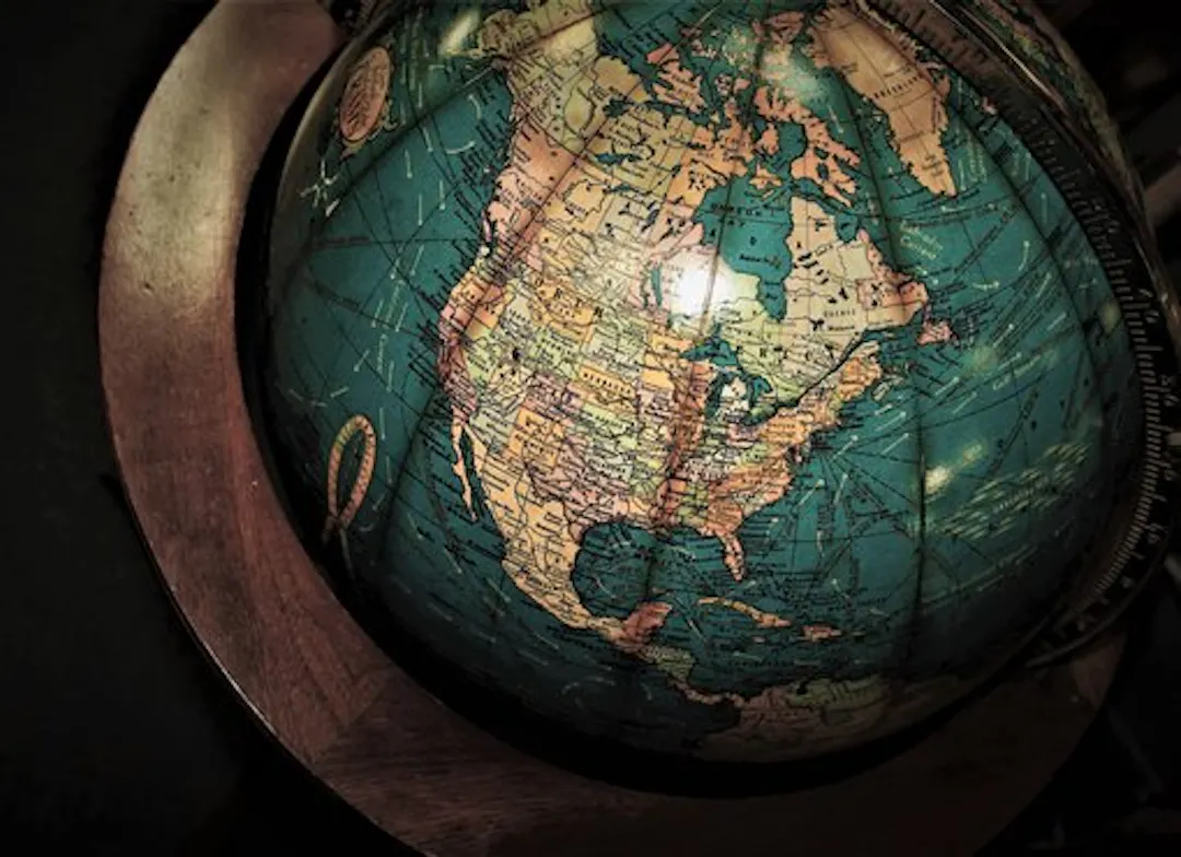 Close-up of a vintage world globe showing North America