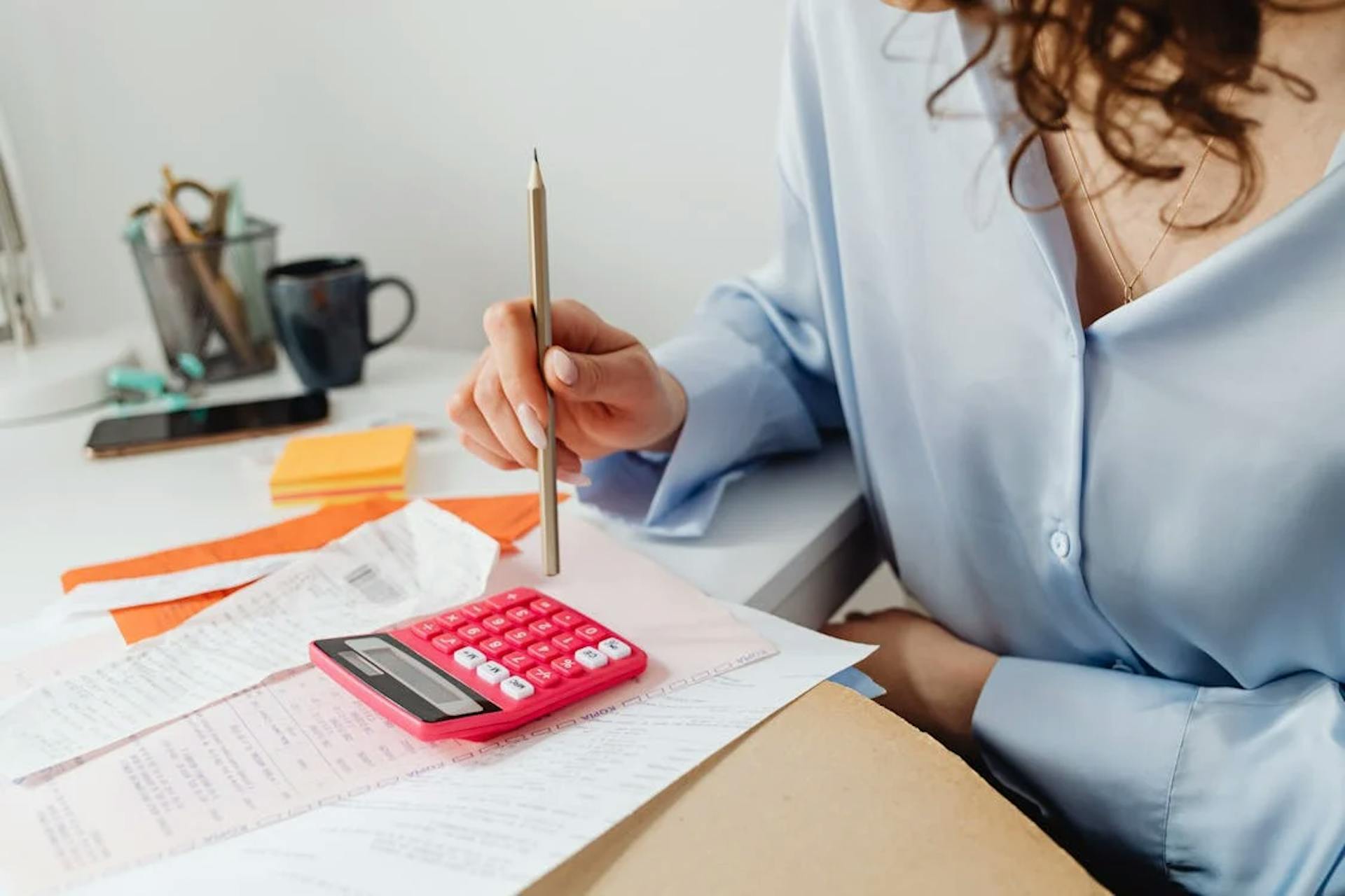 Woman calculating taxes