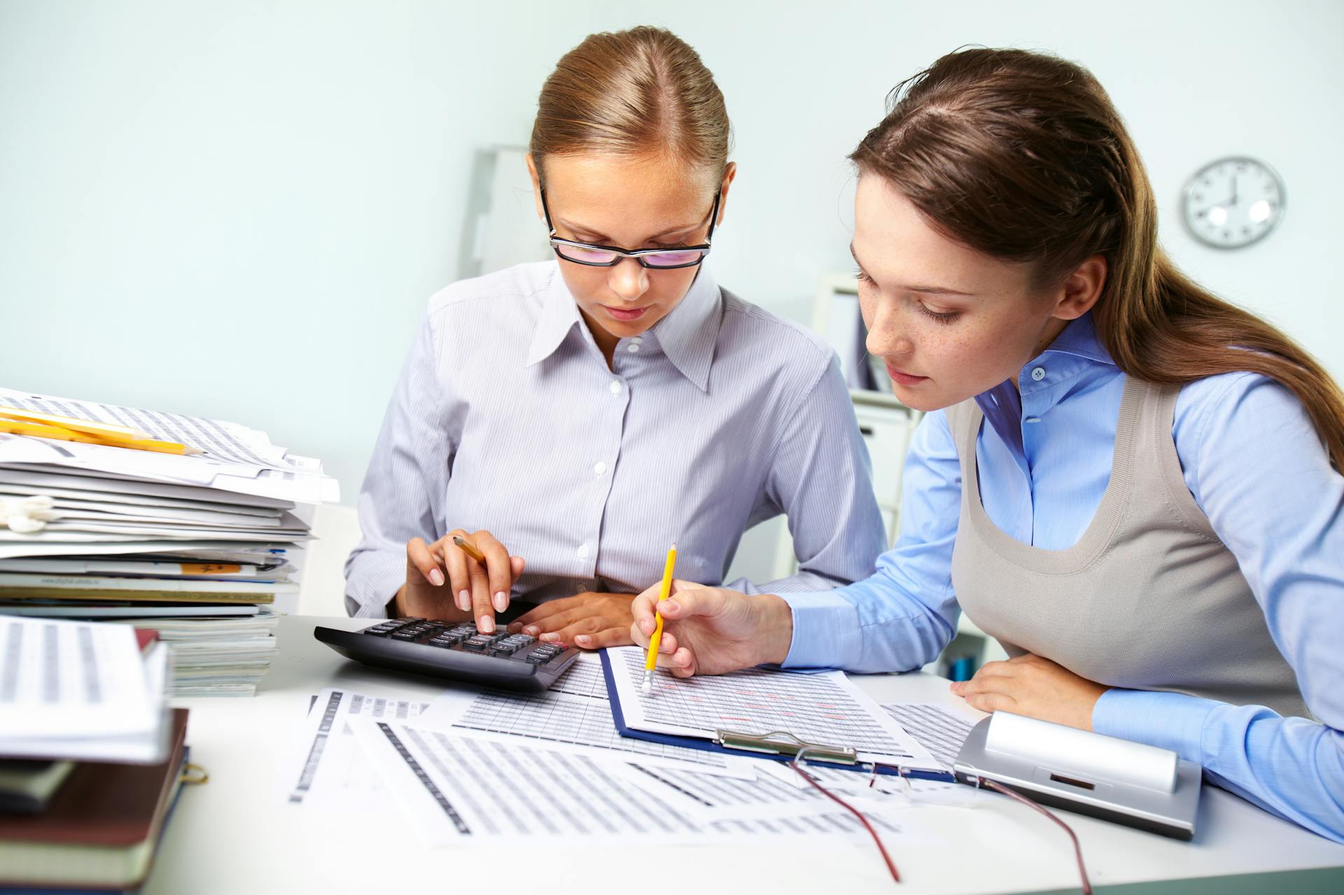 Businesswomen reviewing results