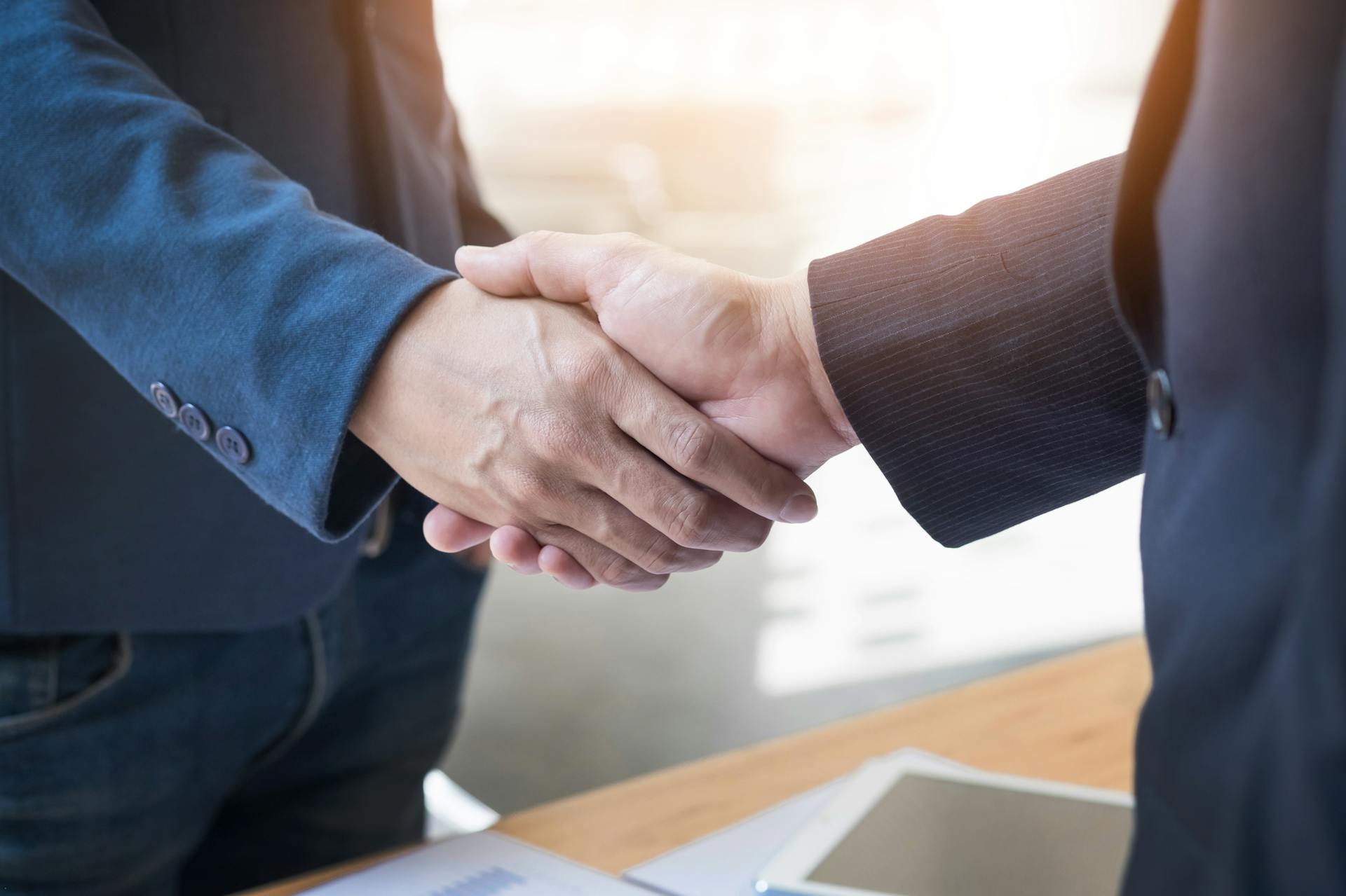 Two businessmen shaking hand image