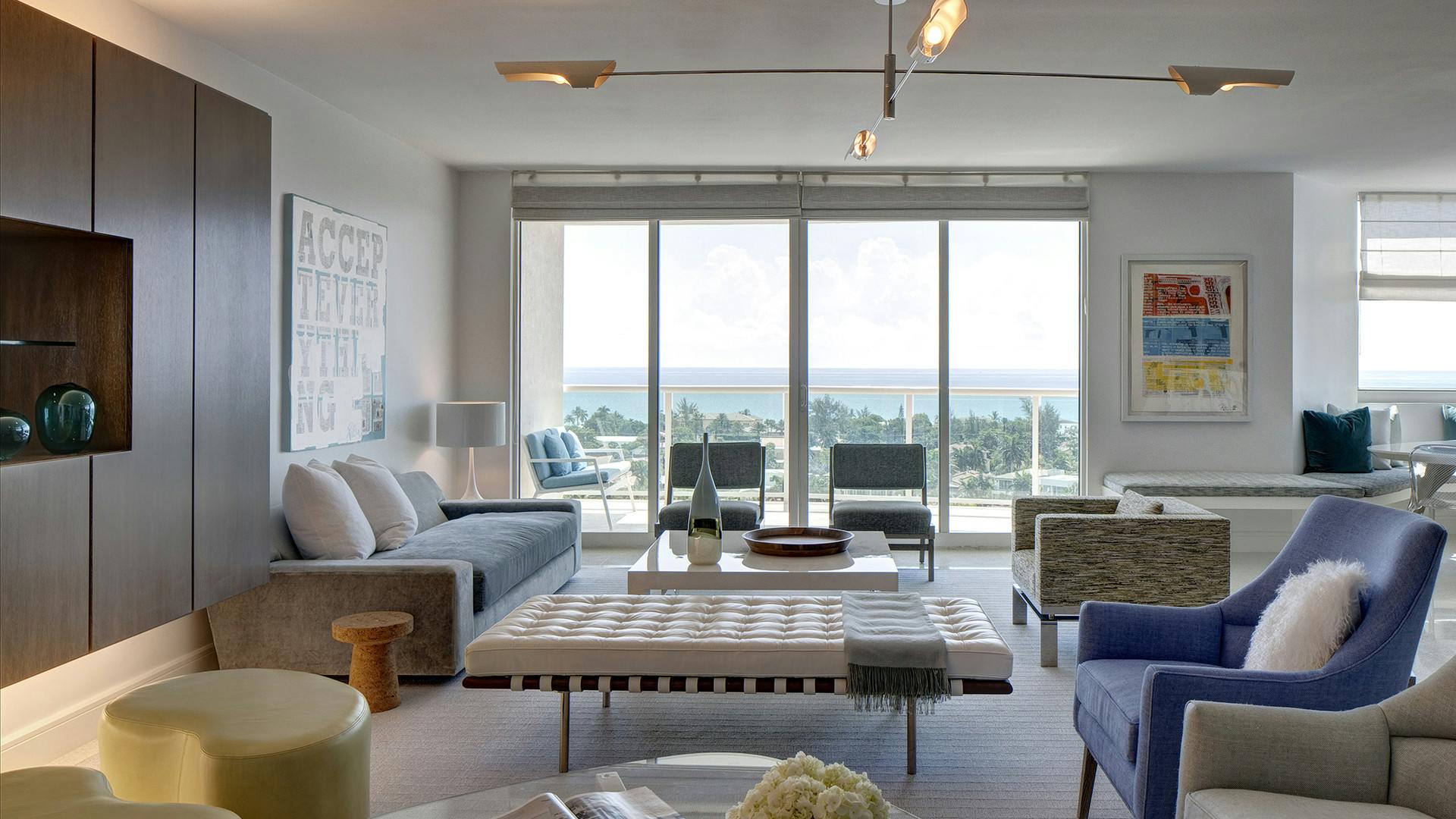 GRADE's Miami Condo living room with modern furnishings and ocean view