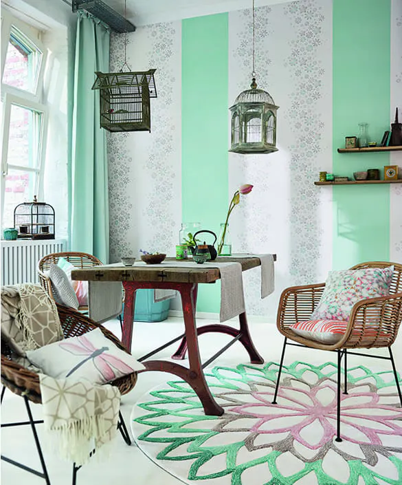 Green pastel room with chairs and a table