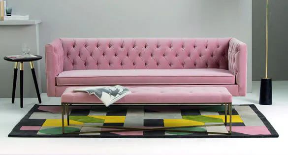 Pink sofa in a light living room