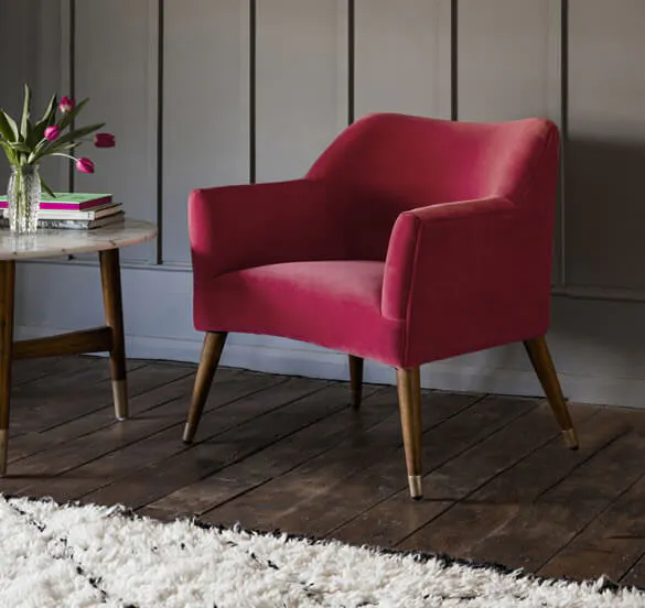 Pink armchair in a living space