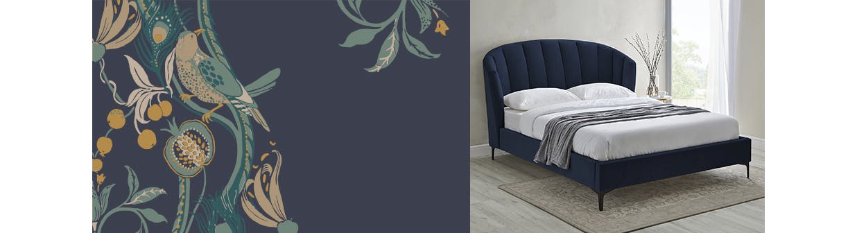 navy upholstered bed in a neutral room