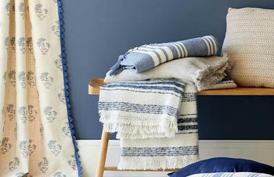Curtains and cushions add warmth