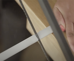 5. When cutting the top bar, it needs to be slightly longer than the fabric, so you only need to take 27mm off the measurement between the brackets. For cordless roller blinds take off 32mm.