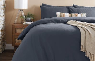 "Cooling cotton bedding in a calming colorway is essential"