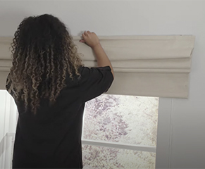 2. Once your brackets are in place, clip the blind headrail onto the brackets, being sure to check it is centred.