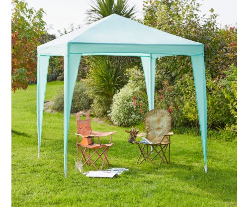 A gazebo in an outdoor setting, featuring a roof and open sides.