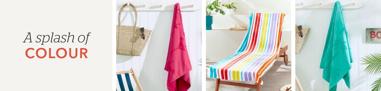 A collection of large, brightly coloured beach towels