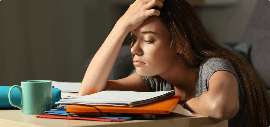 Student studying with books