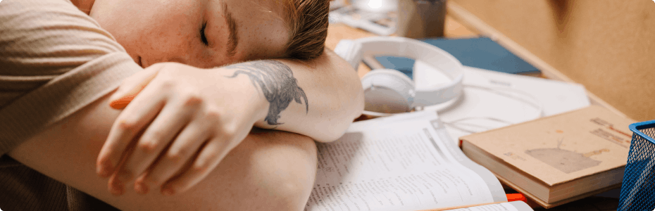 Students sleeping on a desk