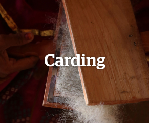 The wool is then carded: a combing process that  aligns the fibres and removes any impurities. This ensures a consistent feel to the yarn.  