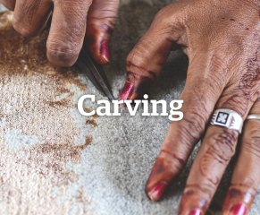 Some rugs feature carved patterns to add depth and texture. This involves carefully hand trimming the pile to create raised and recessed designs.  