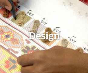 Designers draw intricate patterns, inspired by traditional motifs or modern aesthetics. These serve as the blueprint for the entire rug-making process.