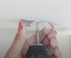 2. Using a pencil, mark the position of the brackets and drill the holes, fixing the brackets in place using suitable fixings and rawlplugs.