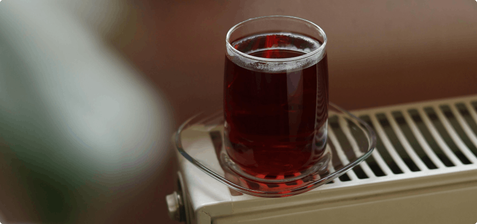 Warm tea resting on a radiator