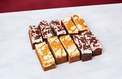 Treat yourself with a choice of sticky toffee with Biscoff® spread or black forest traycake