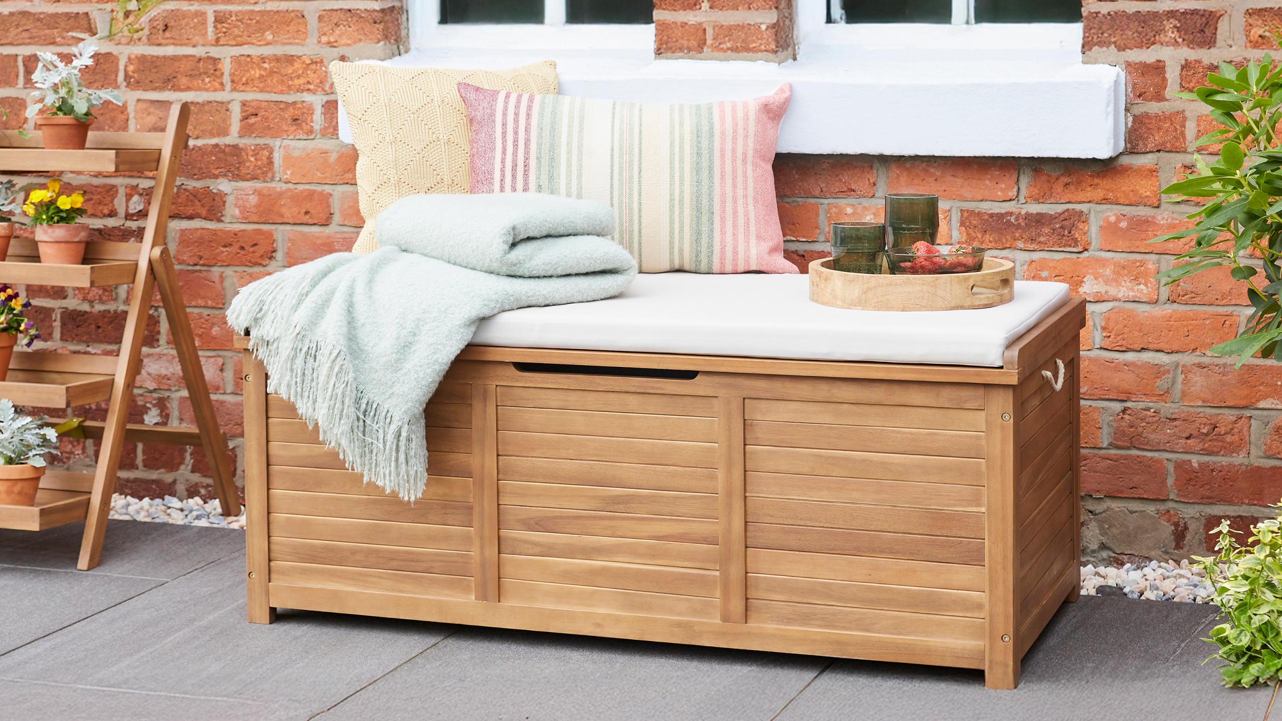 Wooden storage box with seat pad