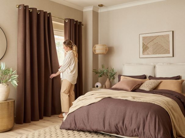 Bedroom setting with blackout curtains