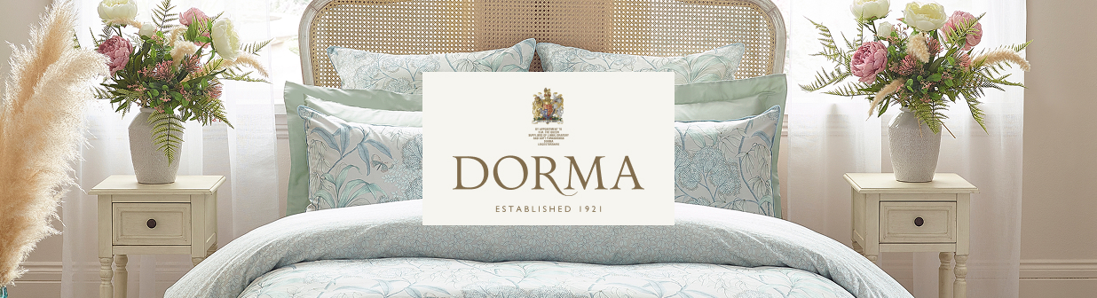 Established in 1921 with a vision to elevate the quality and prestige of bedroom textiles, our Dorma brand proudly showcases a long and rich heritage of British design.
For over a century, Dorma’s expertly crafted products have brought joy, comfort and luxury to thousands of homes. Our dedication to impeccable standards has been acknowledged by the granting of a Royal Warrant – a mark of recognition for the ongoing supply of goods to the Royal household – since 1961.