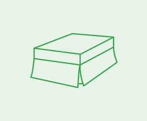 A fitted valance sheet goes on top of the mattress and hangs over the mattress and the base.