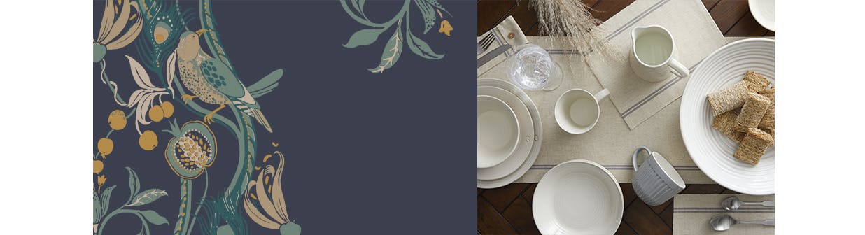 Dining table dressed with plates, mugs, glasses and a table runner