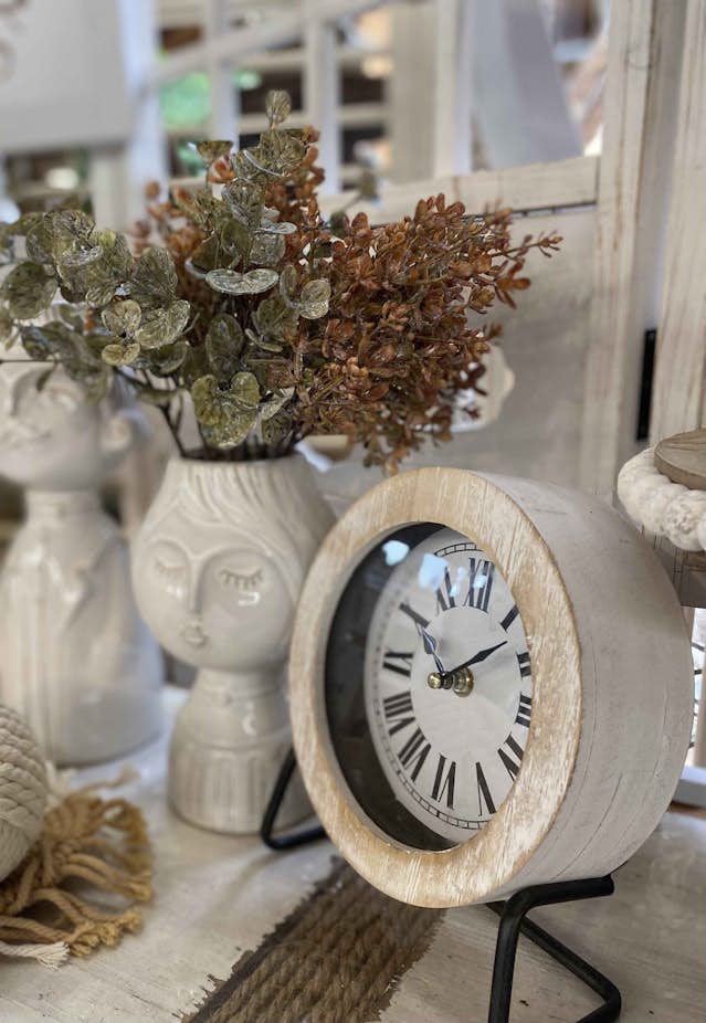 Decorative boutique clock and small vases