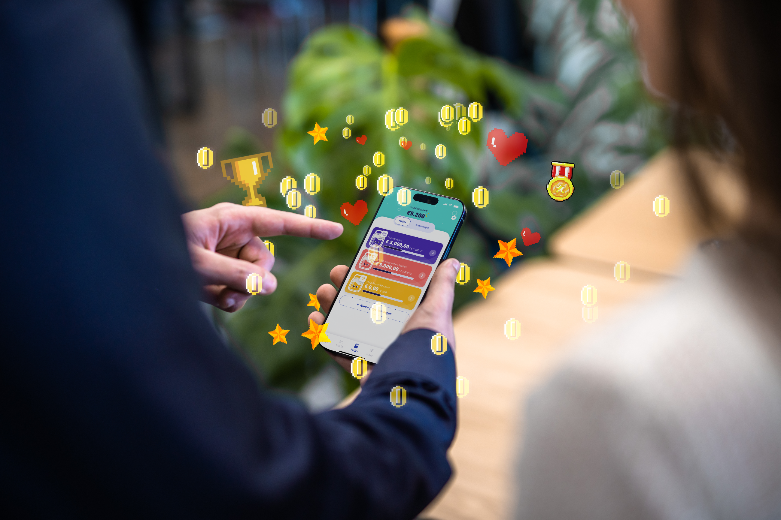 Image of a mobile app with game elements flying around it.