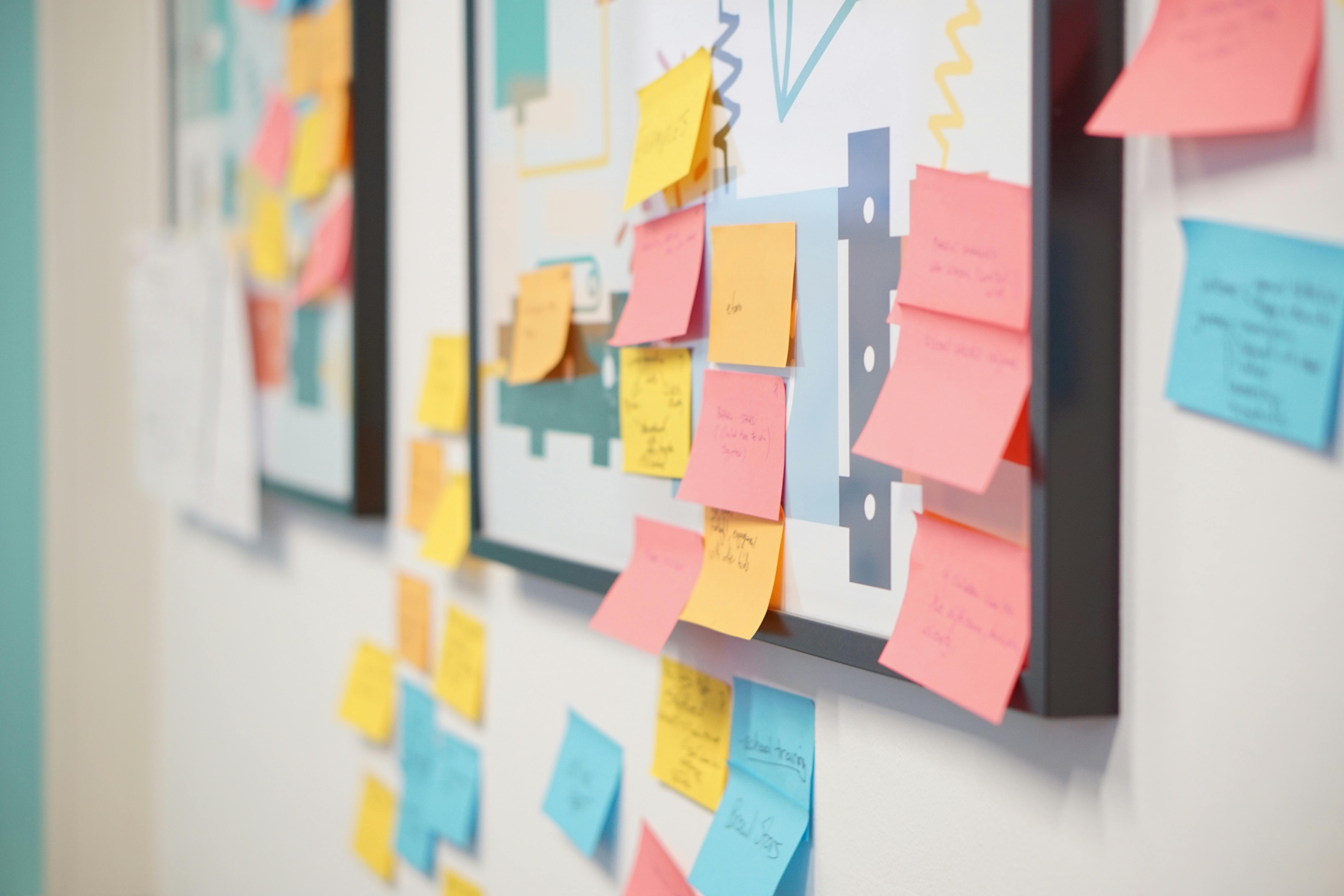 Post-its on a wall during a strategy brainstorm