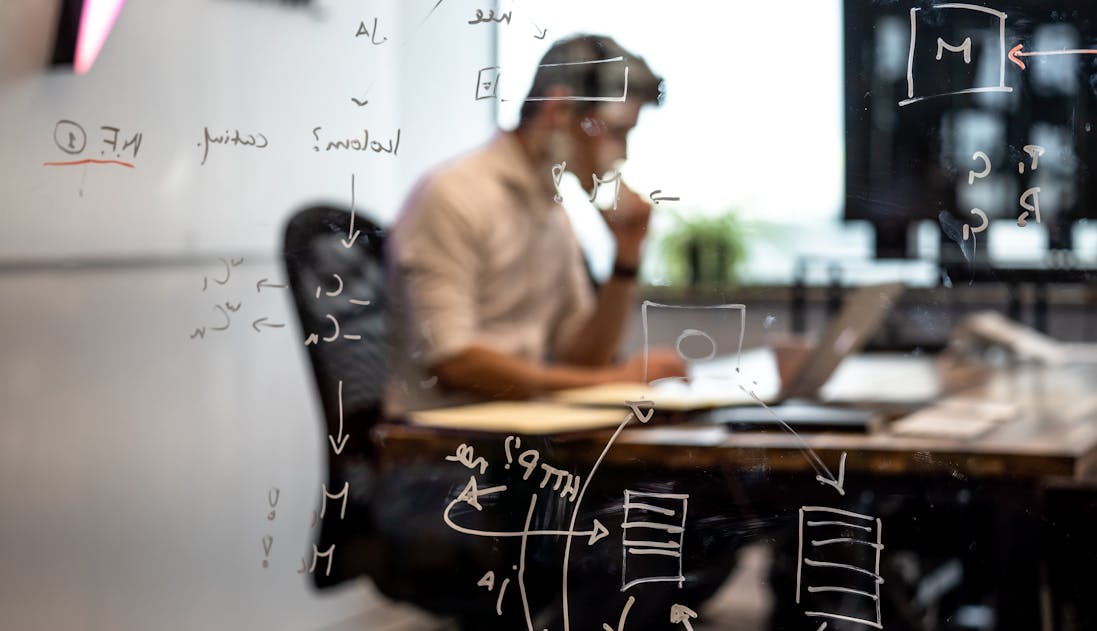 Glenn Bergmans blurred with algorithms in front