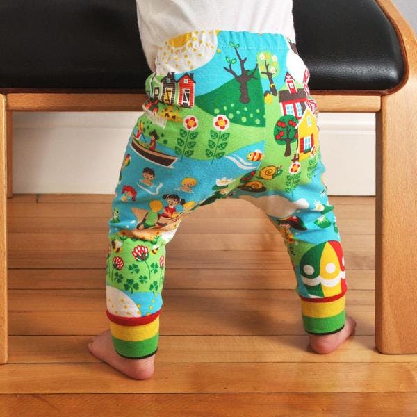  Image of baby wearing brightly colored leggings