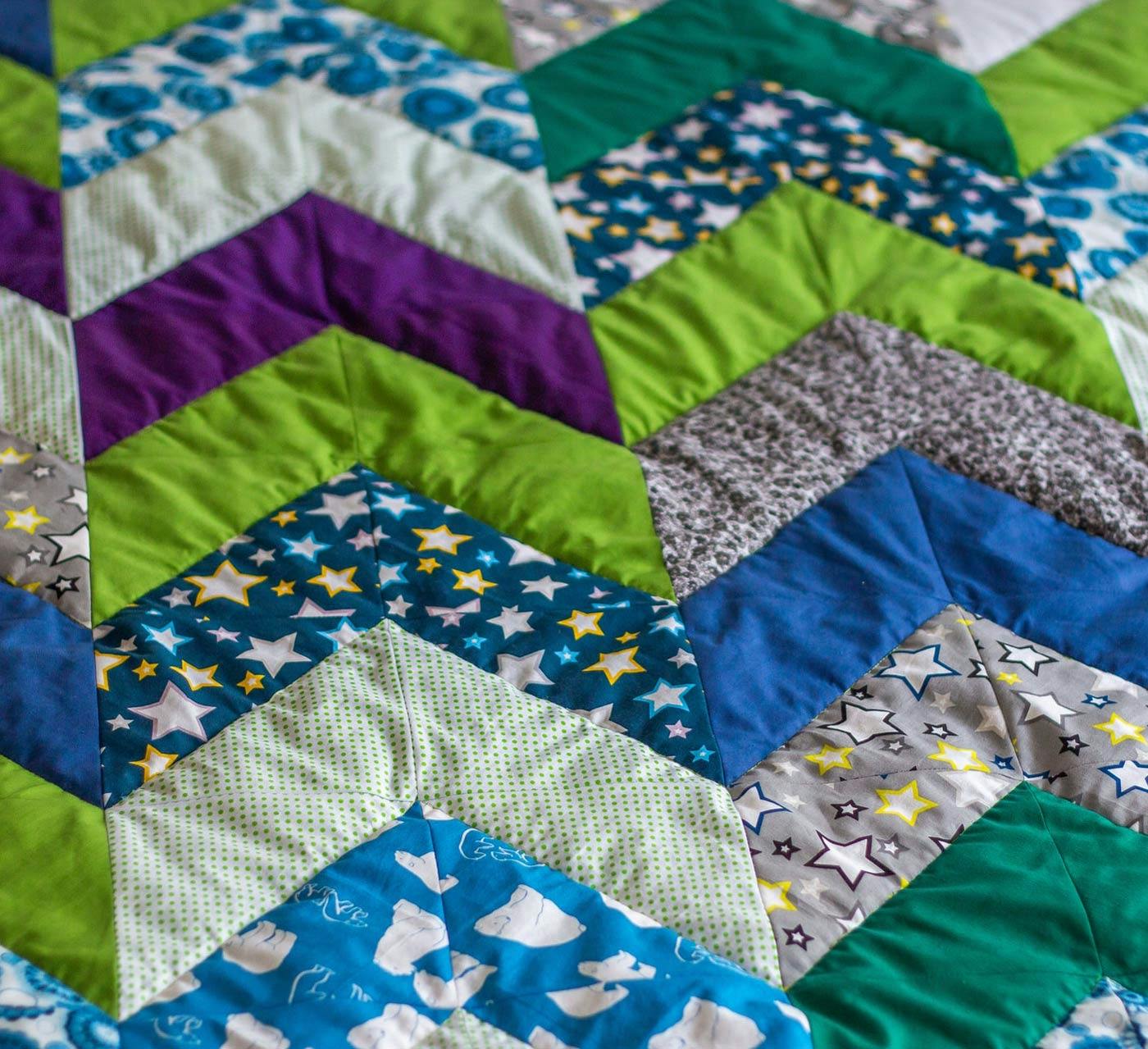  multi colored patterned herringbone quilt