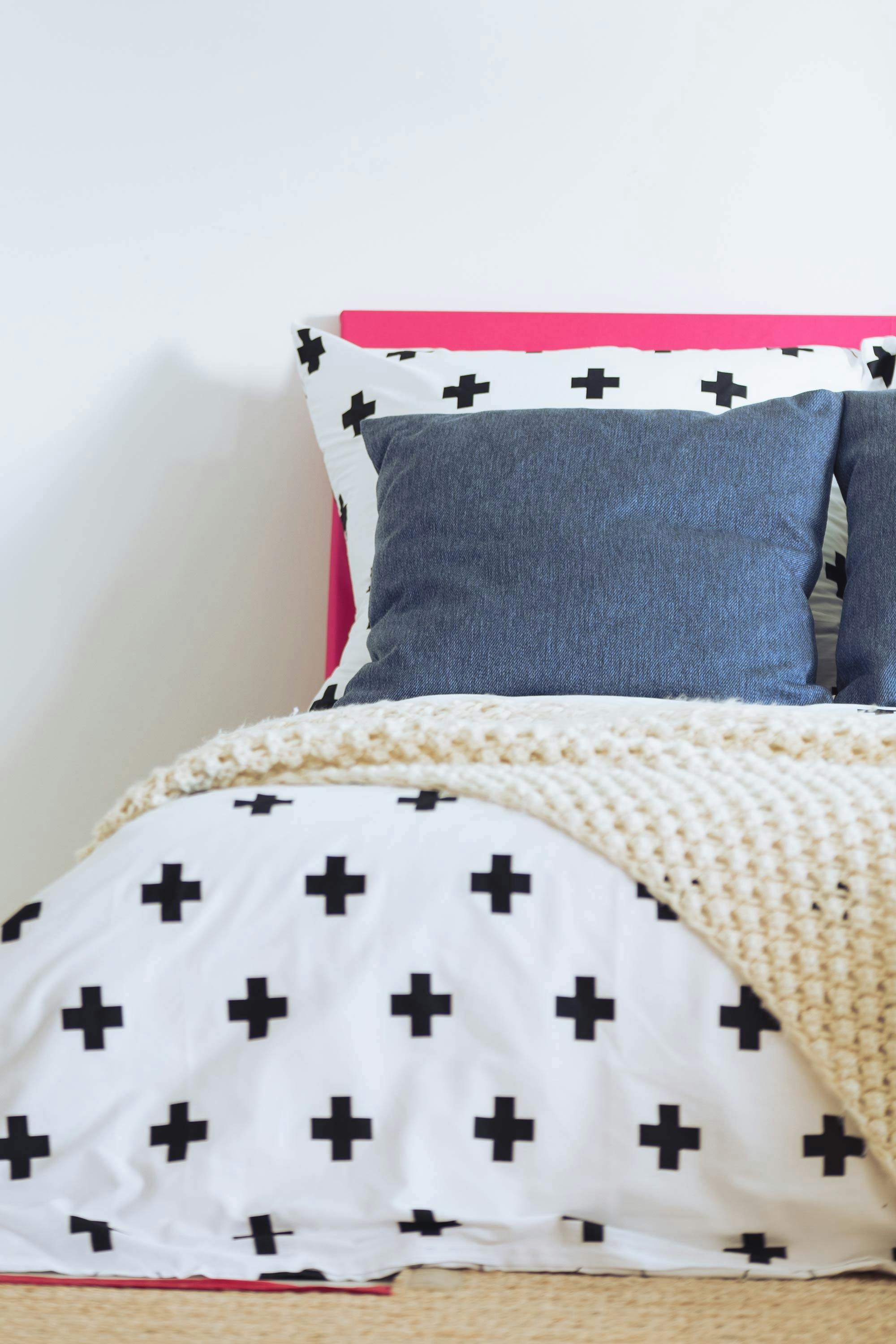  monochromatic geometric bedspread on double bed