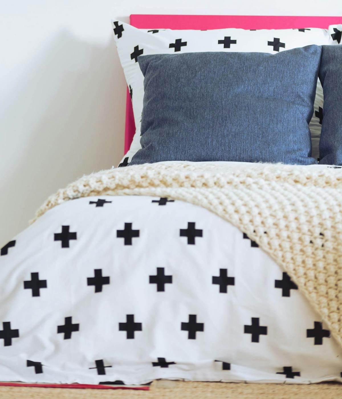  monochromatic geometric bedspread on double bed