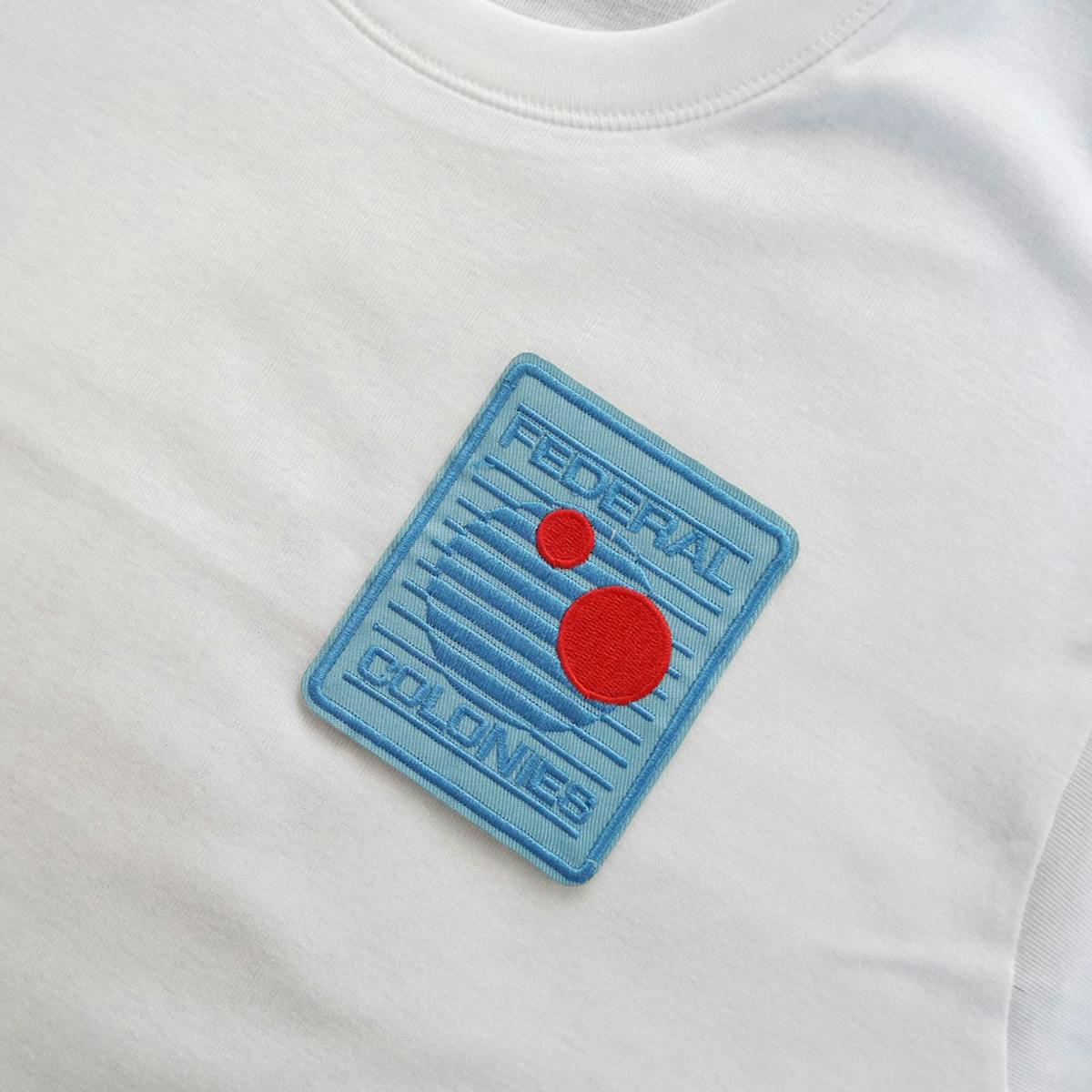 Embroidered patch for ironing on clothing in blue and red Embroidered patch for ironing on clothing in blue and red