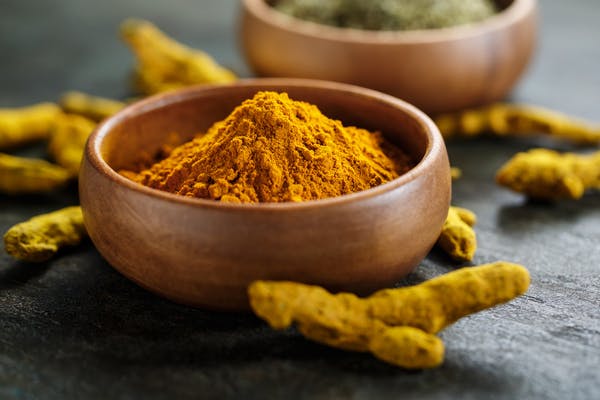  Bowl of powdered Turmeric