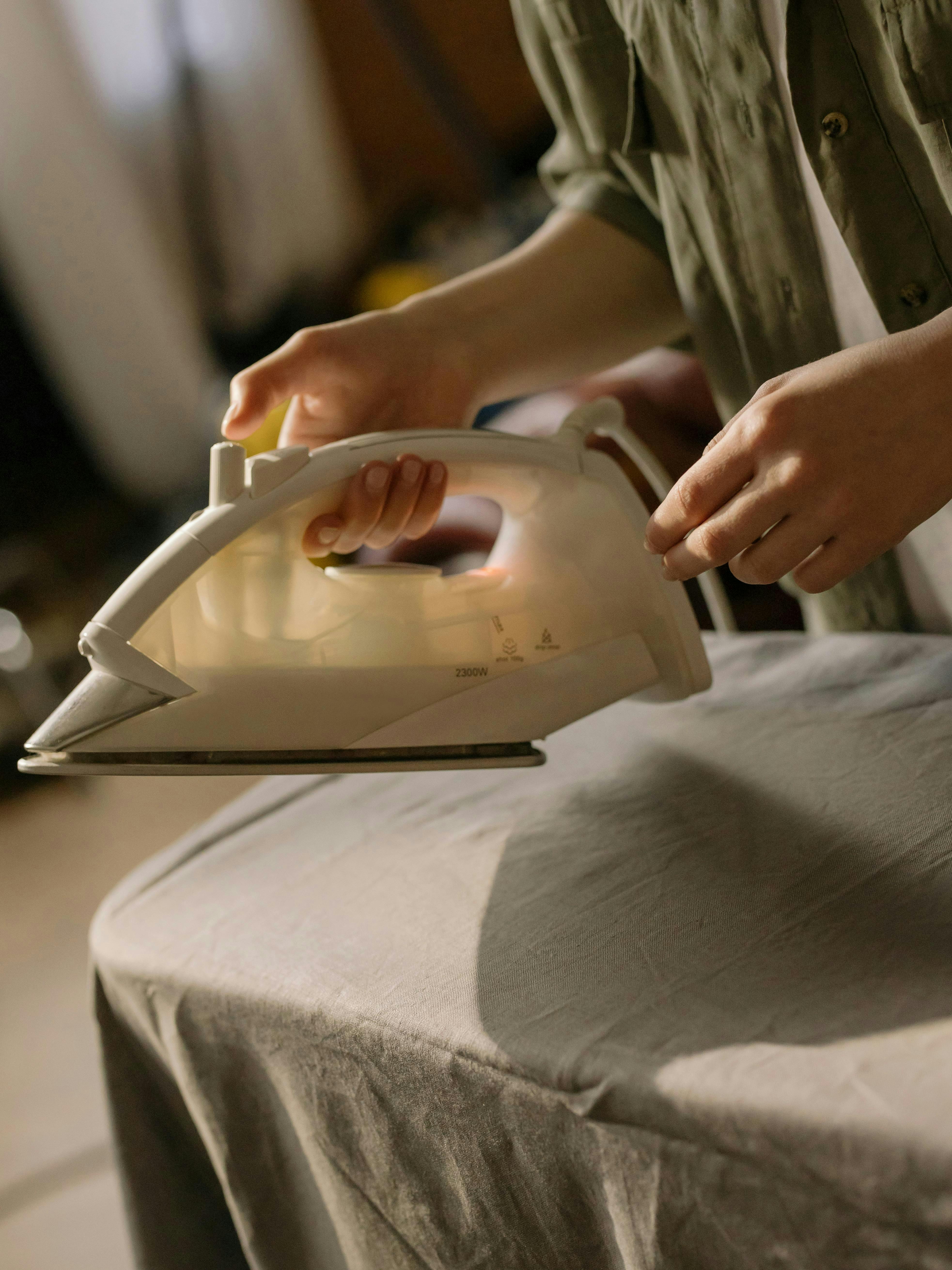 someone holding an iron