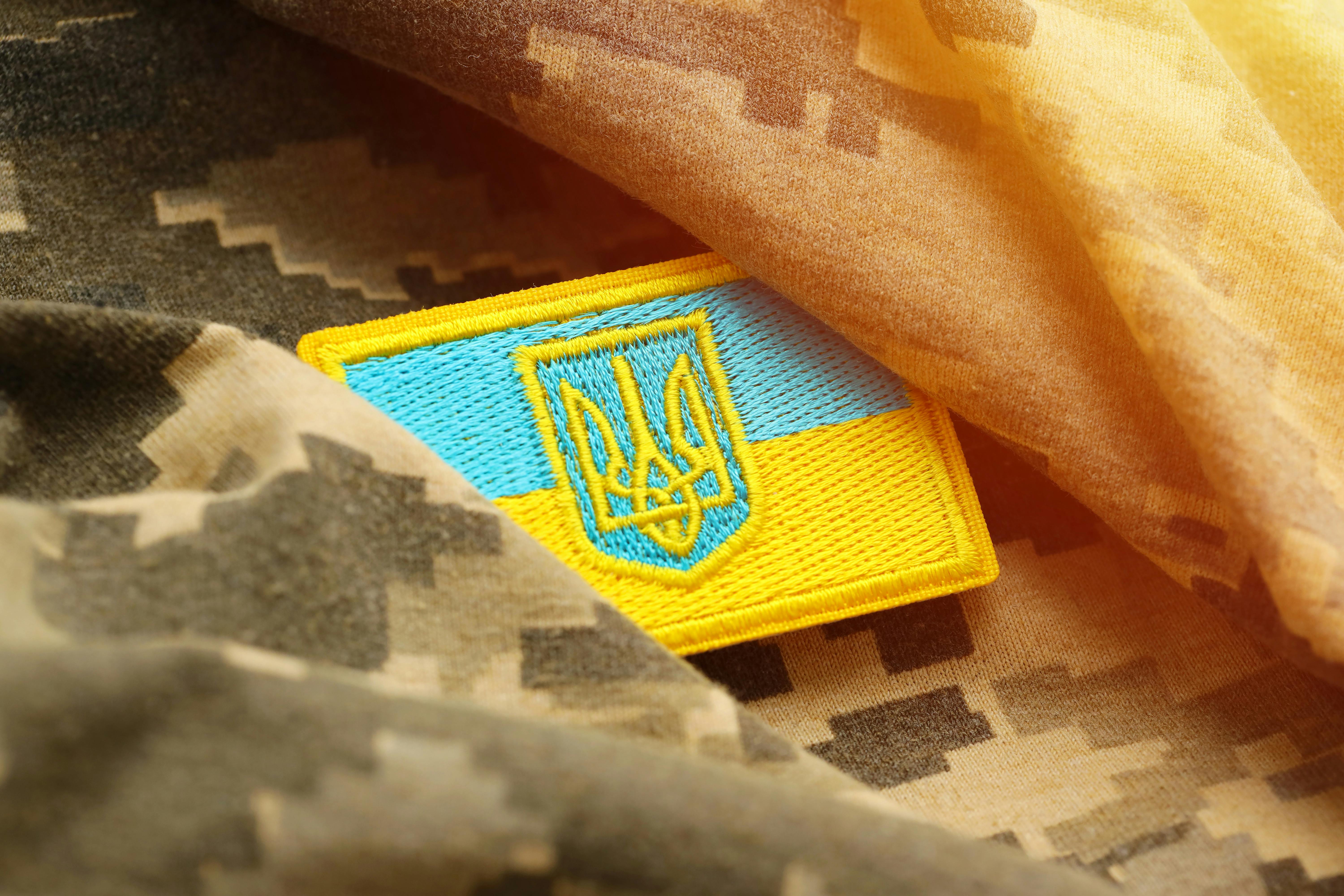  Bright blue and yellow patch on a military uniform